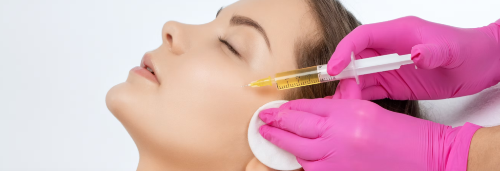 prf treatment under eyes, syringe near cheek